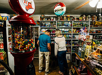 People shopping in country store