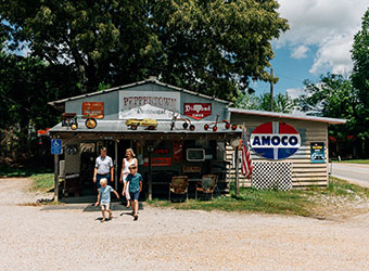 Family in front of Restaurant